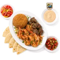 Grilled shrimp and meat platter