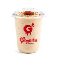 Date juice with milk, honey, and nuts